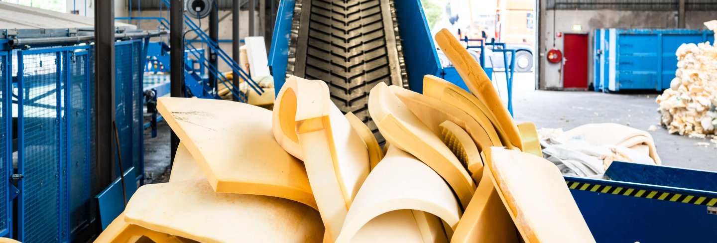 mattresses being recycled through a machine